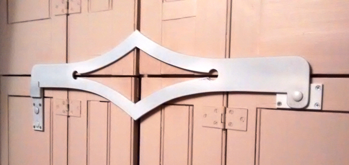 Gothic shaped decorative split shutter bar